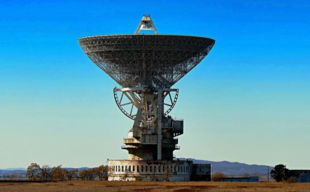 Technician installing aviation-grade satcom antenna